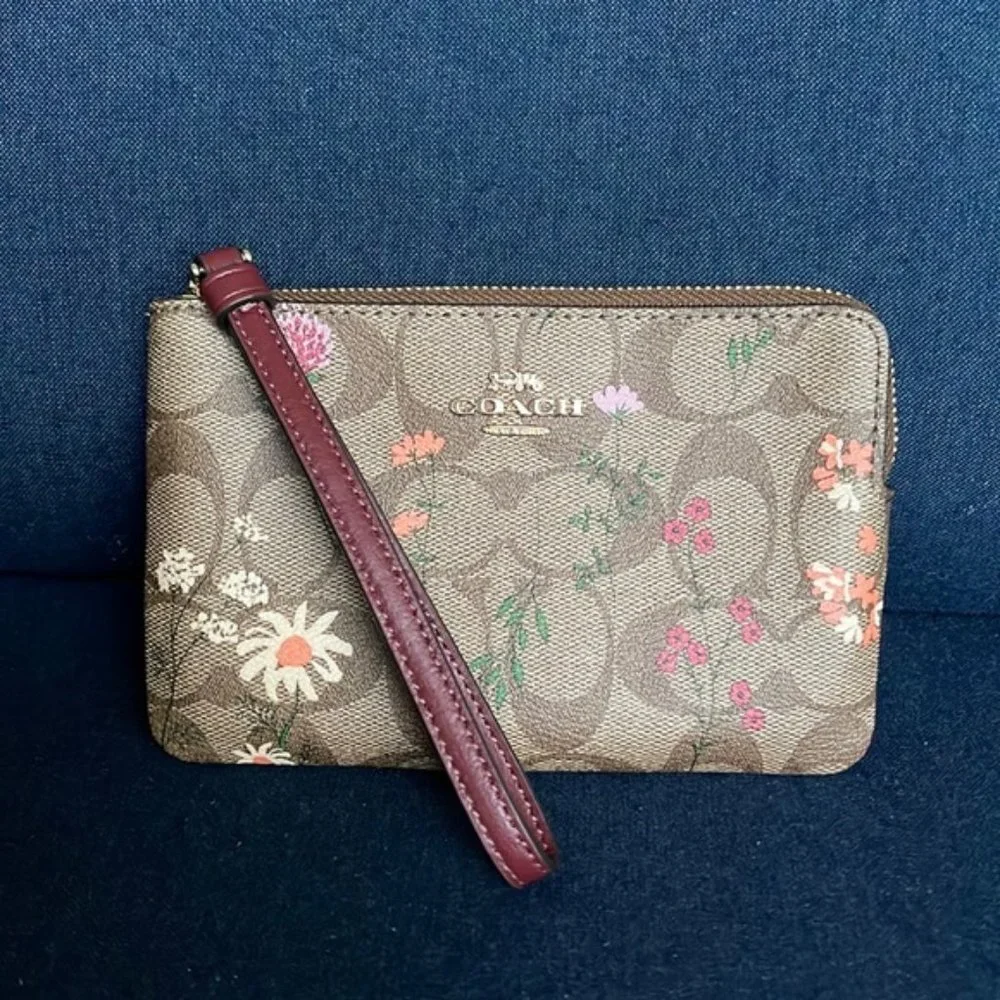 Coach Corner Zip Wristlet In Signature Canvas With Wildflower Print